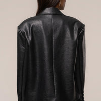 «Allure structurée» — veste oversize, noire