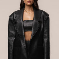 «Allure structurée» — veste oversize, noire