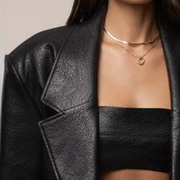 «Allure structurée» — veste oversize, noire